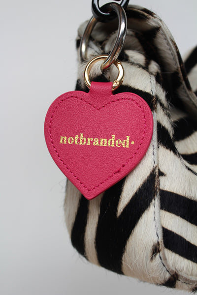 Notbranded Tascheanhänger mit Spiegel